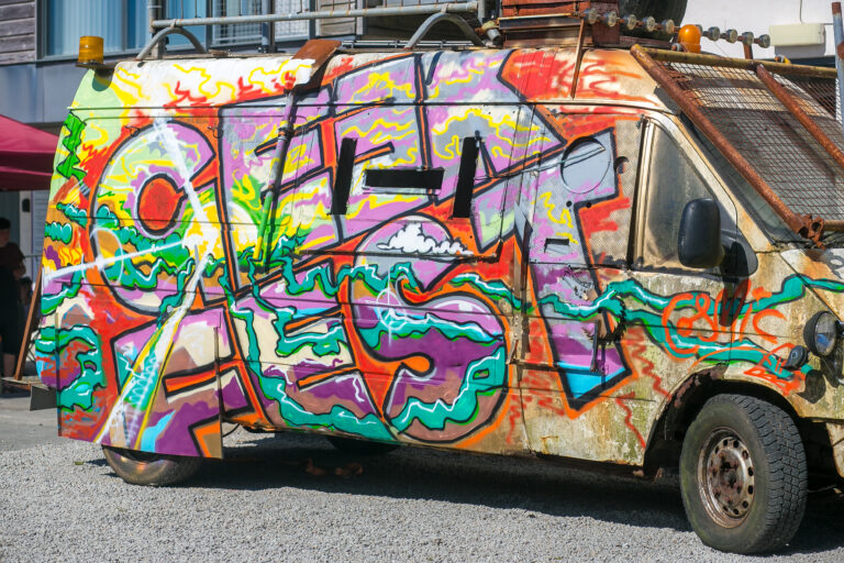 Geekfest fan covered in multicoloured graffiti