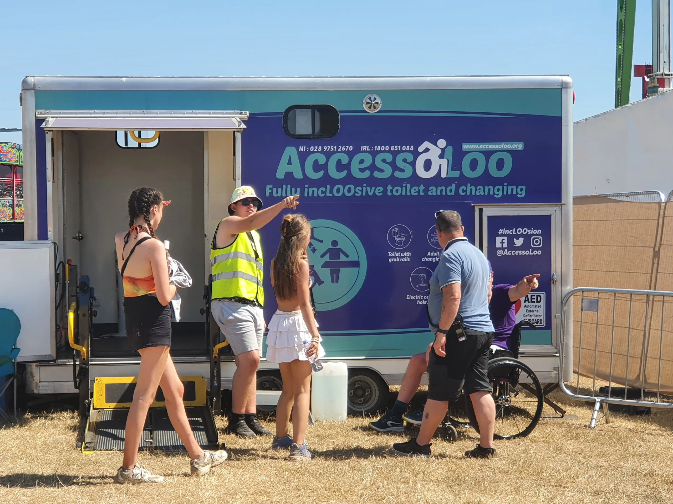 outside Accessoloo, 3 people are making enquires 