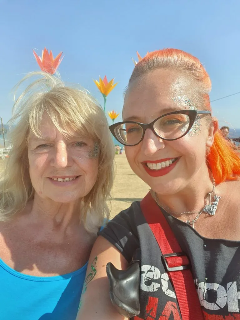 Ally and Mary covered in glitter and looking happy