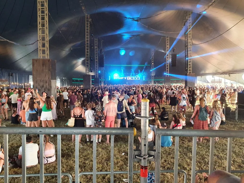 Crowd dancing inside the unleashed tent
