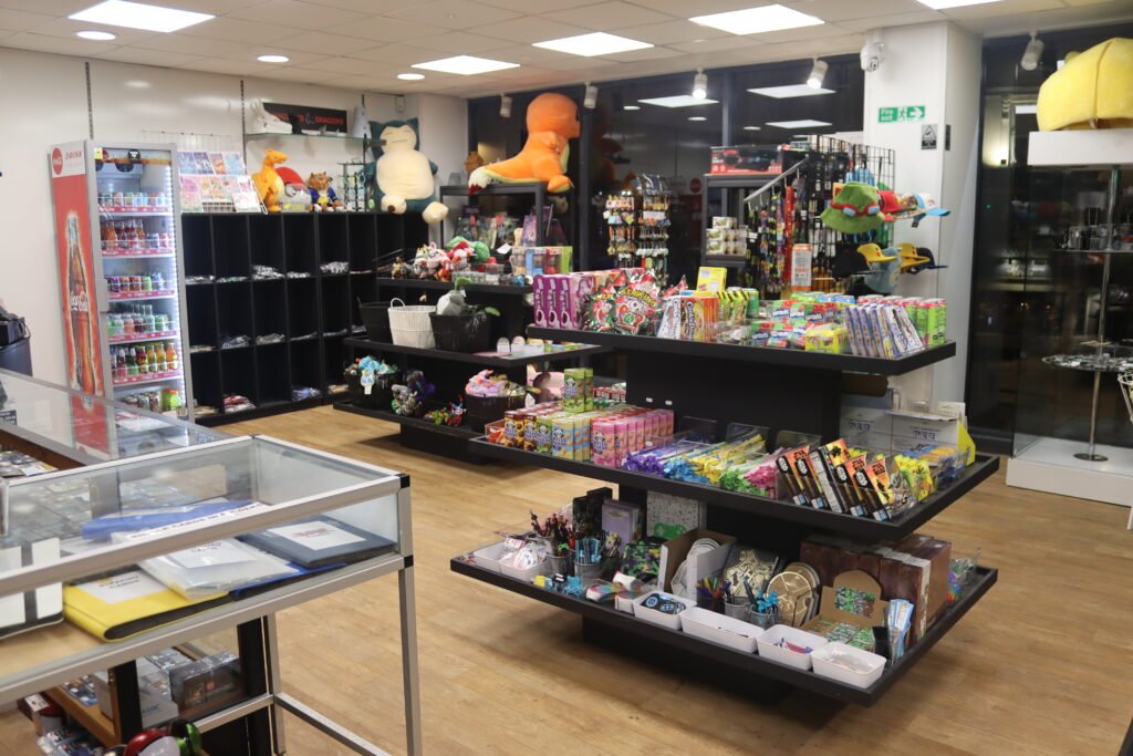Game On entrance gift shop. showcasing a host of sweets, gaming memorabilia, cuddly toys, hats and stationary 