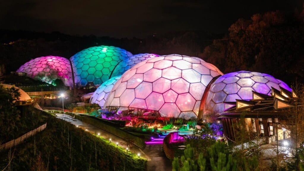 The Eden Project Biomes lit in different colours at night