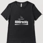 Black T shirt with the design I will do it ADHDreckly and discreet Access Cornwall logo above