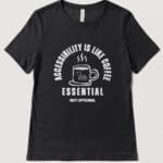 Black T shirt with a circular design around a coffee cup saying Accessibility is like coffee, essential, not optional