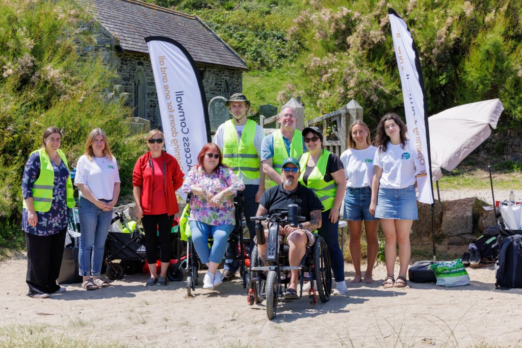 The Access Cornwall team and volunteers, with Lydia from the National Trust and team from Clean Cornwall at Church Cove, Gunwalloe after their beach clean